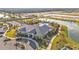 Aerial view of community clubhouse, pool, and other amenities at 1530 Laurel Brook Ln, Port Charlotte, FL 33953
