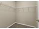 Large walk-in closet with wire shelving at 1530 Laurel Brook Ln, Port Charlotte, FL 33953
