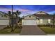 Charming house with brick driveway and landscaping at 1530 Laurel Brook Ln, Port Charlotte, FL 33953