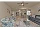 Open living room with seating area and views to dining and entry at 1530 Laurel Brook Ln, Port Charlotte, FL 33953