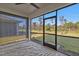 Spacious screened porch overlooking backyard at 1530 Laurel Brook Ln, Port Charlotte, FL 33953