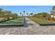 Two bocce ball courts feature artificial turf and a modern design at 1530 Laurel Brook Ln, Port Charlotte, FL 33953