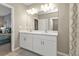 Double vanity bathroom with a shower at 1530 Laurel Brook Ln, Port Charlotte, FL 33953