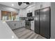 Modern kitchen featuring white shaker cabinets, stainless steel appliances, and quartz countertops at 199 Angol St, Punta Gorda, FL 33983