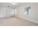 Spacious bedroom with tile floors and ample closet space at 2624 Lee St, Punta Gorda, FL 33950