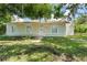 House exterior, front view, with landscaping at 2624 Lee St, Punta Gorda, FL 33950