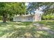 House exterior, front view, with landscaping at 2624 Lee St, Punta Gorda, FL 33950