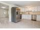 Modern kitchen with stainless steel appliances and white cabinets at 2624 Lee St, Punta Gorda, FL 33950