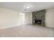 Living room featuring a stone fireplace and tile flooring at 2624 Lee St, Punta Gorda, FL 33950