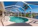 Inviting screened pool area, perfect for relaxation and entertaining at 3730 Turtle Dove Blvd, Punta Gorda, FL 33950