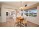 Charming breakfast nook with water views and wood flooring at 3730 Turtle Dove Blvd, Punta Gorda, FL 33950