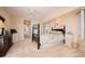 Spacious bedroom with a ceiling fan and large windows at 3730 Turtle Dove Blvd, Punta Gorda, FL 33950