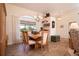 Charming dining room with hardwood floors and a built-in shelving unit at 3730 Turtle Dove Blvd, Punta Gorda, FL 33950