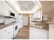 Bright eat-in kitchen, featuring granite countertops and stainless steel appliances at 3730 Turtle Dove Blvd, Punta Gorda, FL 33950