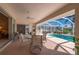 Relaxing covered patio overlooking the refreshing pool at 3730 Turtle Dove Blvd, Punta Gorda, FL 33950