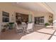Spacious covered patio with adjacent pool and relaxing seating at 3730 Turtle Dove Blvd, Punta Gorda, FL 33950