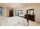 Main bedroom with pool view and ample closet space at 3730 Turtle Dove Blvd, Punta Gorda, FL 33950