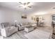 Spacious living room with light flooring, comfortable seating and open floor plan at 17084 Acapulco Rd # 222, Punta Gorda, FL 33955
