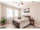 Bedroom with a brown bed frame and gray walls at 17084 Acapulco Rd # 222, Punta Gorda, FL 33955