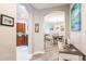 Bright and spacious entryway with views into the living and kitchen areas at 17084 Acapulco Rd # 222, Punta Gorda, FL 33955