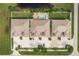 Overhead view of three-unit condo building with parking and pool at 17084 Acapulco Rd # 222, Punta Gorda, FL 33955