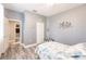 Bedroom with white bed frame, coastal decor, and closet at 17084 Acapulco Rd # 222, Punta Gorda, FL 33955