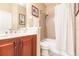 Clean bathroom with single vanity, shower, and tub at 17084 Acapulco Rd # 222, Punta Gorda, FL 33955