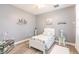 Bedroom with a white bed frame and coastal decor at 17084 Acapulco Rd # 222, Punta Gorda, FL 33955