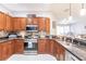 Modern kitchen with stainless steel appliances and granite countertops at 17084 Acapulco Rd # 222, Punta Gorda, FL 33955