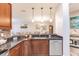 Modern kitchen with stainless steel appliances and granite countertops at 17084 Acapulco Rd # 222, Punta Gorda, FL 33955