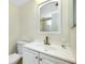 Clean bathroom with vanity, toilet and mirror at 1515 Forrest Nelson Blvd # G102, Port Charlotte, FL 33952