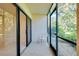 Spacious screened patio with tiled floor and sliding glass doors at 1515 Forrest Nelson Blvd # G102, Port Charlotte, FL 33952