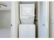 Stackable washer and dryer in a closet at 1515 Forrest Nelson Blvd # G102, Port Charlotte, FL 33952