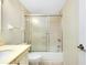 Clean bathroom with a shower/tub combo and neutral tile at 1515 Forrest Nelson Blvd # G102, Port Charlotte, FL 33952