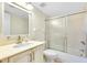 Clean bathroom with a tub shower combination, vanity with sink, and a toilet at 1515 Forrest Nelson Blvd # G102, Port Charlotte, FL 33952