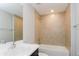 Clean bathroom with tiled shower and tub at 4645 E Forlano Cir, North Port, FL 34291