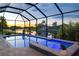 Enclosed pool and spa with waterfront view at 15466 Seafoam Cir, Port Charlotte, FL 33981