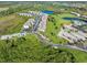 Aerial view of condo community nestled in lush green landscape at 175 Kings Hwy # B6-526, Punta Gorda, FL 33983