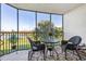 Relaxing screened balcony overlooking a tranquil lake view at 175 Kings Hwy # B6-526, Punta Gorda, FL 33983