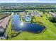 Community pool and tennis courts with surrounding landscape and parking at 175 Kings Hwy # B6-526, Punta Gorda, FL 33983