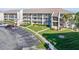Two-story building with parking and landscaping at 175 Kings Hwy # B6-526, Punta Gorda, FL 33983