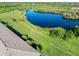 Aerial view showcasing property's tranquil waterfront location and green space at 175 Kings Hwy # B6-526, Punta Gorda, FL 33983