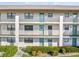 Two-story building with teal doors and balconies at 175 Kings Hwy # B6-526, Punta Gorda, FL 33983