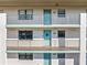 Two-story building with teal doors and balconies at 175 Kings Hwy # B6-526, Punta Gorda, FL 33983