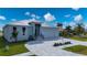 Single-Gathering home with metal roof and paver driveway at 3712 Carmichael Dr, Punta Gorda, FL 33950