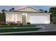Tan house with white garage door and landscaping at 27101 N Twin Lakes Dr, Punta Gorda, FL 33955
