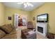 Inviting living room featuring a fireplace and comfortable seating area at 1676 Palace Ct, Punta Gorda, FL 33980