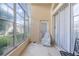 Relaxing sunroom with glass walls and sliding doors at 1676 Palace Ct, Punta Gorda, FL 33980