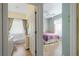 Bedroom and bathroom with a view into the room at 1676 Palace Ct, Punta Gorda, FL 33980