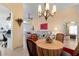 Casual dining area with a round table and four chairs near the kitchen at 1676 Palace Ct, Punta Gorda, FL 33980
